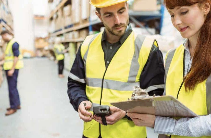 Health and safety manager reviewing workplace risk controls