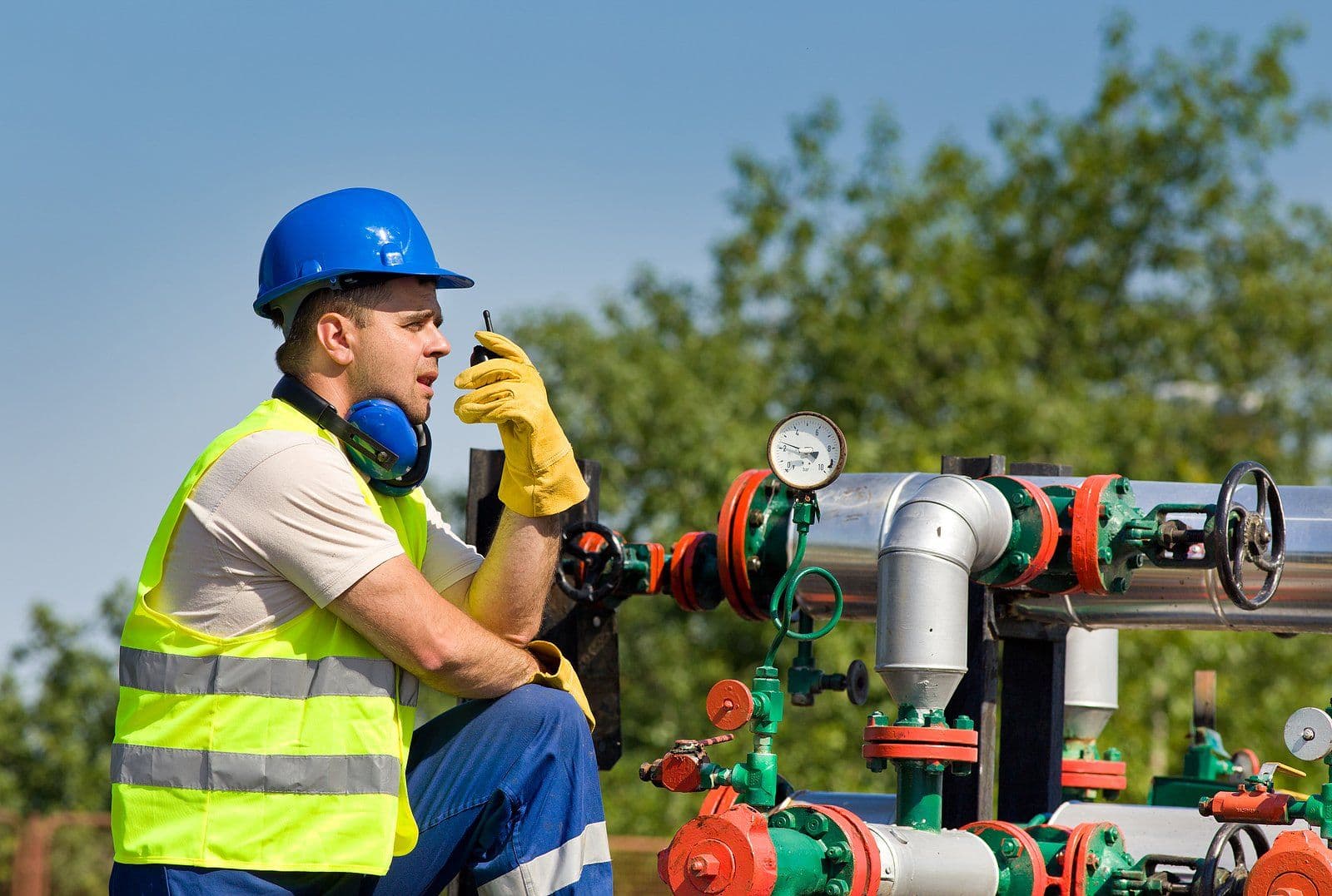 Industrial safety inspection with professionals reviewing compliance